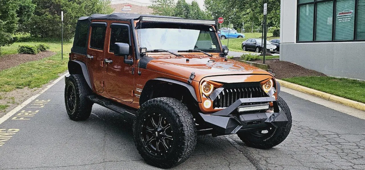 Used 2011 Jeep Wrangler Unlimited Sahara w/ Dual Top Group