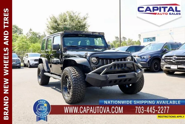 Used 2012 Jeep Wrangler Unlimited Sport w/ Black Appearance Group